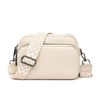 sac bandoulière fourr-tout en cuir véritable blanc avec bandoulière zébrée assortie sur fond blanc