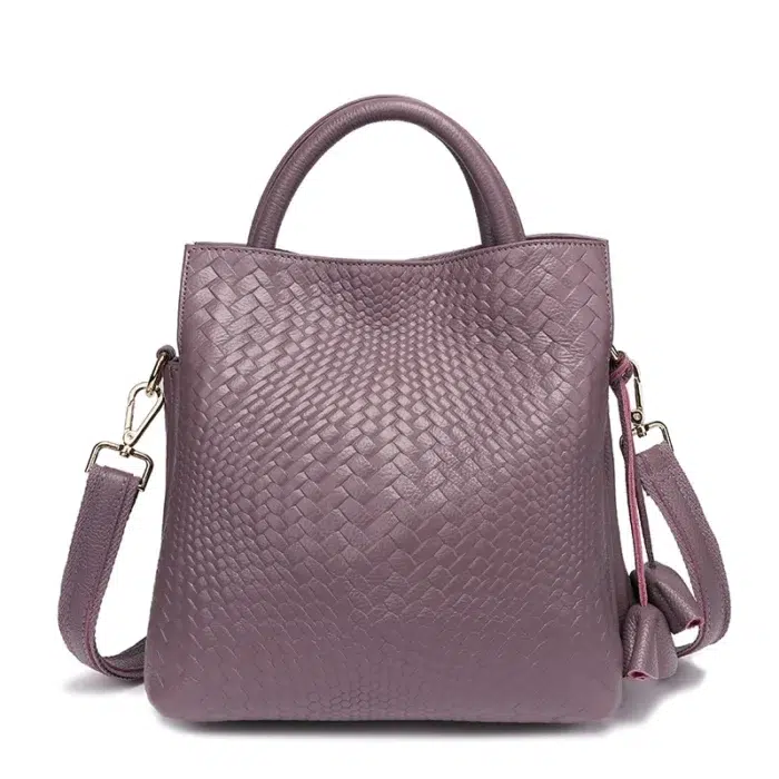 Sac à main en cuir véritable tressé coloris parme