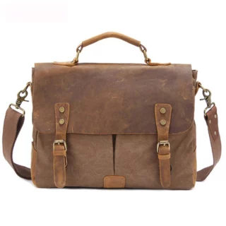 Accueil Sac bandoulière homme en cuir et toile marron, cartable vintage vu de face avec rabat à boucles